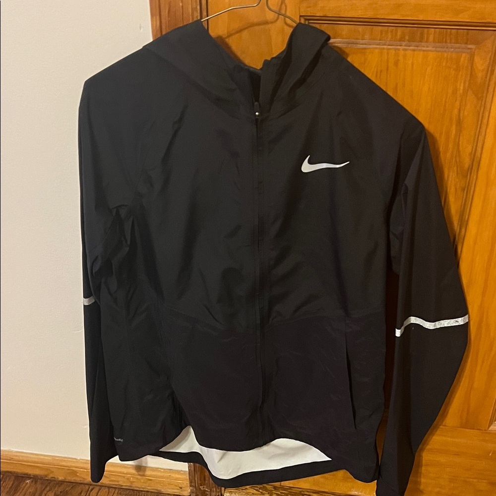 Nike woman’s Black Windbreaker with gray Accents